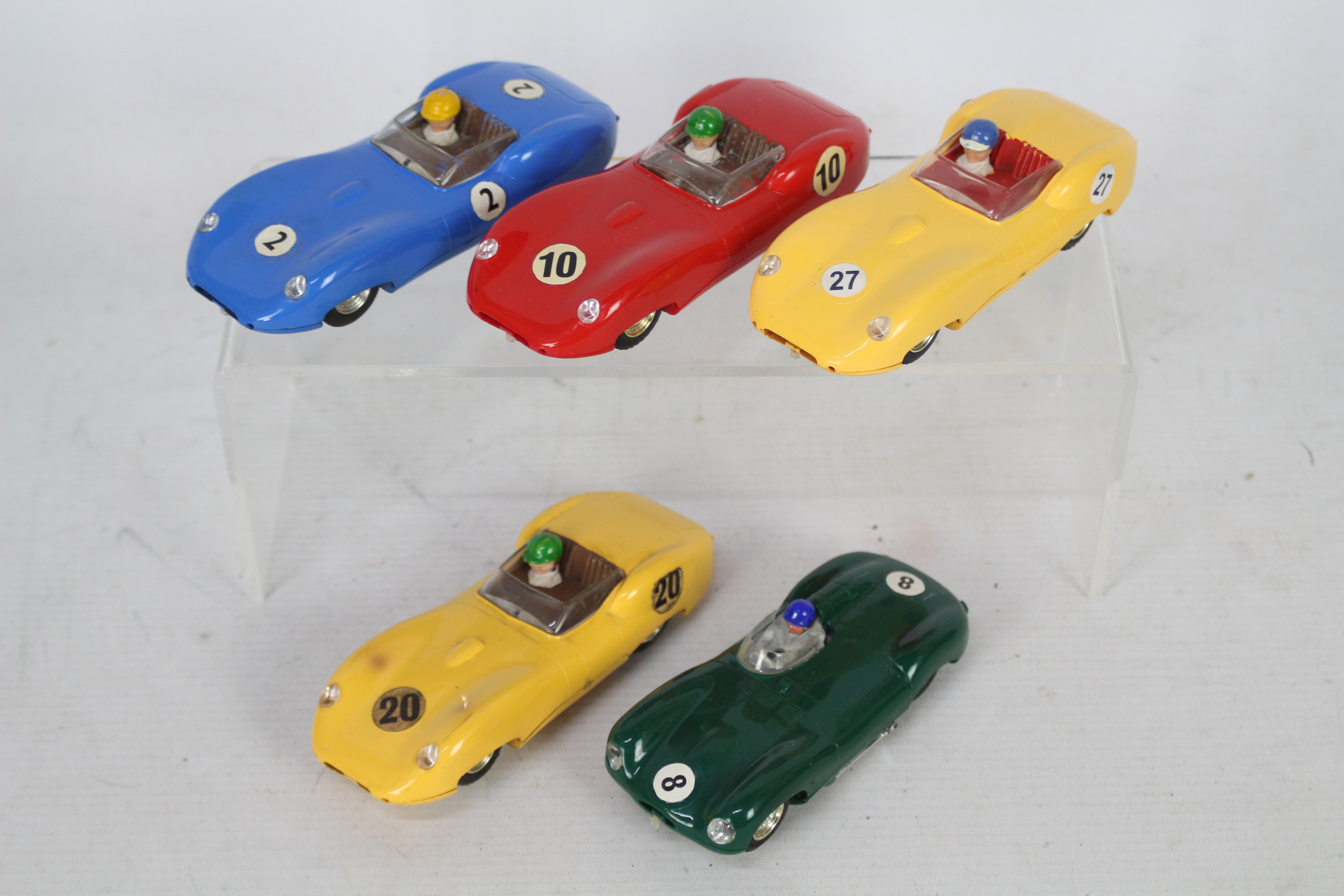 Scalextric - A pride of five unboxed vintage Scalextric racing Jaguar slot cars.