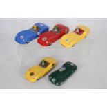 Scalextric - A pride of five unboxed vintage Scalextric racing Jaguar slot cars.