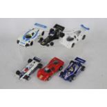 Scalextric - A grid of six unboxed Scalextric F1 and Sports cars.