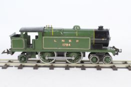 Hornby - A 1930s O gauge 4-4-2 tank engine in LNER green livery operating number 1784. # No.2.