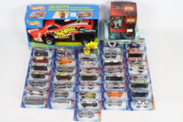 Hot Wheels - A collection of 38 x carded models including Ferrari 550 Maranello # B3852,