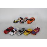 Scalextric - A mixed group of eight unboxed Scalextric slot cars.