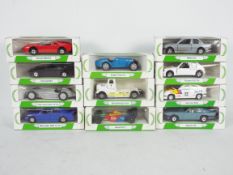 Corgi - 12 boxed diecast model vehicles from Corgi's 'Mobil Performance Car Collection'.