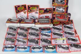 Road Champs - A collection of over 30 carded / boxed Police / Emergency themed diecast models from