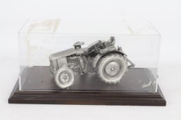 Unknown Maker - A pewter die-cast Deutz model tractor.