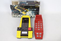A Galaxy Invader 1000 computer space battle game by Gakken with original storage-worn box and