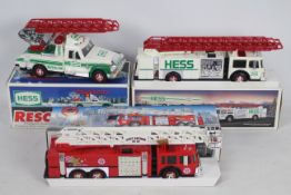 Hess (Gasoline) - Three boxed plastic battery operated 1:35 scale US Fire and Rescue Trucks /