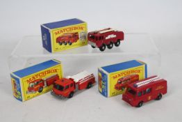 Matchbox - Three boxed Matchbox regular wheels diecast Fire Engines.
