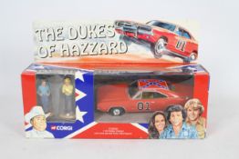 Corgi - A Dukes Of Hazzard set with a 1:36 scale General Lee Dodge Charger with figures of Bo and