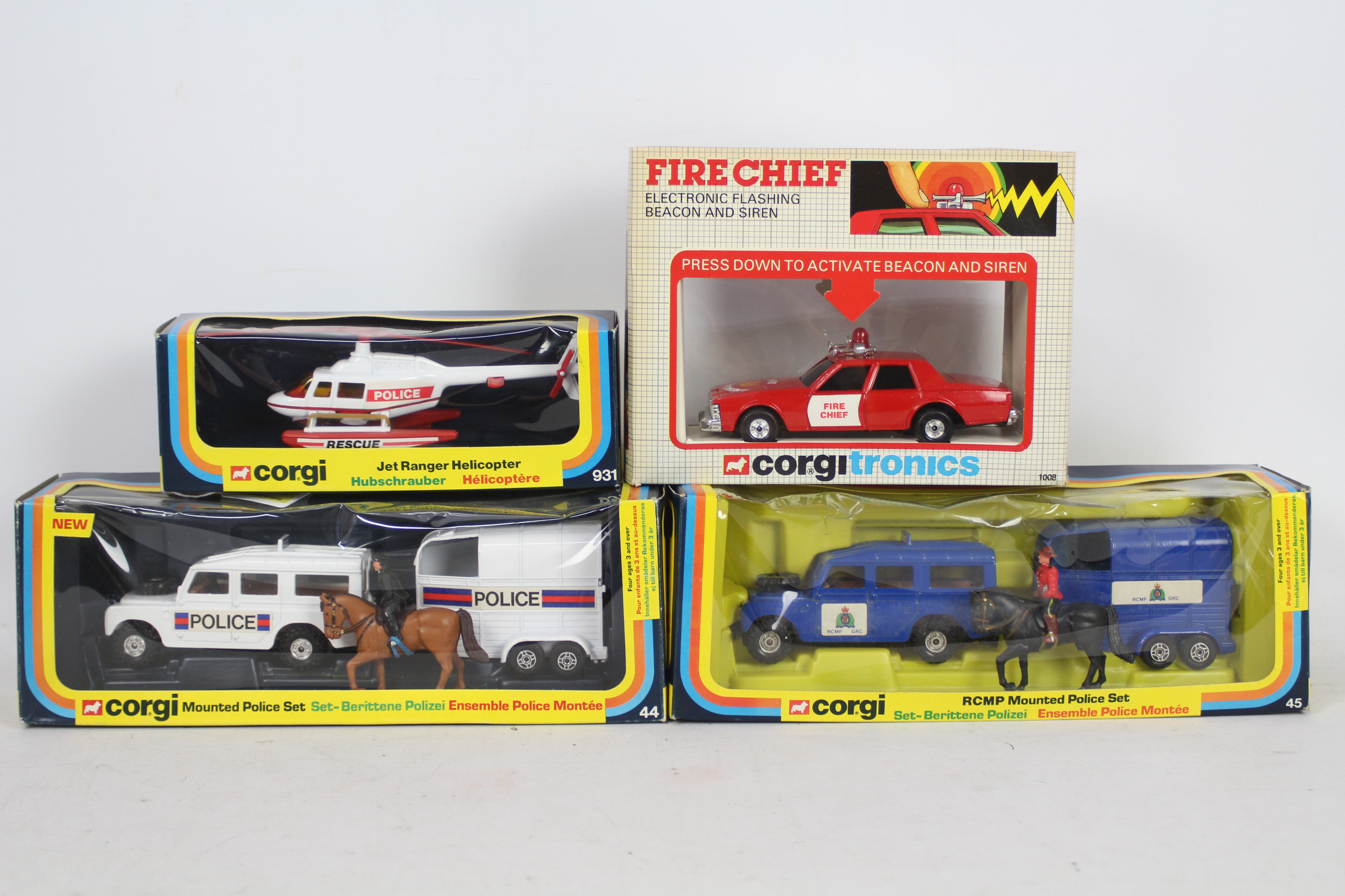 Corgi - Four boxed Corgi diecast model vehicles.