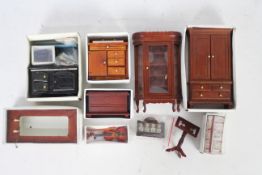 Wooden detailed dolls house furniture including tables, toilet, mirror and more. Unbranded.