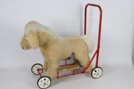 Tri-ang - Rovex - A vintage Pedigree Soft Toy push along ride on horse toy.