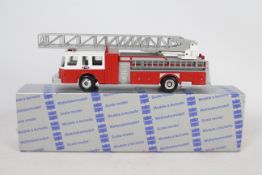 Conrad - A boxed 1:50 scale Conrad #5504 Emergency One Turntable Ladder Fire Engine.