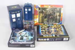 Dr Who - a collection of Dr WHO memorabilia including - Tardis - Audio books - Puzzles.
