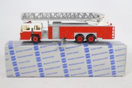 Conrad - A boxed 1:50 scale Conrad #5504 Emergency One Turntable Ladder Fire Engine.