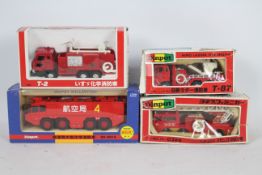 Diapet (Yonezawa) - Four boxed Japanese diecast Fire Engines from Diapet.