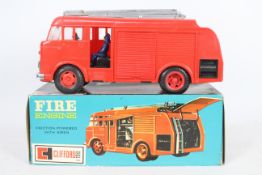 Clifford Toys - A boxed plastic friction powered Clifford Toys #6083 Dennis Fire Engine.