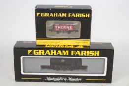 Graham Farish - Bachmann - a boxed 0-6-0 J94 Saddle Tank engine in BR black livery # 372-503 and an