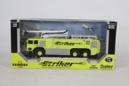 Boley - A boxed 1:48 scale Boley #6001-88 Oshkosh Striker Aircraft Rescue & Firefighting Vehicle.