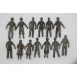 Unknown Maker - An unboxed grouping of 13 vintage 54mm white metal unpainted figures,