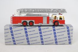 Conrad - A boxed 1:50 scale Conrad #5504 Emergency One Turntable Ladder Fire Engine.