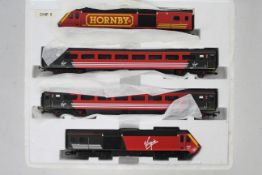 Hornby - A 00 gauge HST train pack in Virgin livery with power car, dummy car and two coaches.