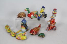 Young Epoch - BZ - MS - Tin Treasures - 8 x tinplate clockwork animals including a family of Ducks,