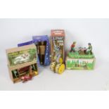 Joyou - Tobar - 4 x boxed clockwork tinplate toys including an Elephant on a drum, a Space Man,