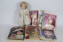 Kestner - A reproduction of a Kestner bisque head toddler doll 'Hilda'.