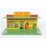 Dinky - A rare Dinky pre war Filling And Service Station in yellow with green roof and base # 48.