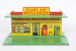 Dinky - A rare Dinky pre war Filling And Service Station in yellow with green roof and base # 48.