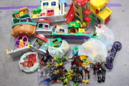 A large collection of Fisherprice figures - playsets - Lego - Hero Factory.