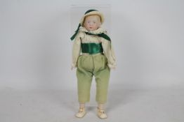 Gebruder Heubach - A reproduction Gebruder Heubach bisque character boy doll,