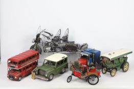 Six decorative tinplate / pressed metal model depicting a variety of vehicles in various scales,