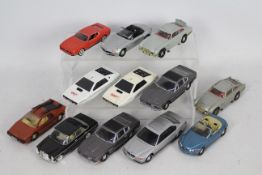 Corgi - James Bond - 12 x unboxed models including Aston Martin Vantage, Lotus Esprit and BMW 750.