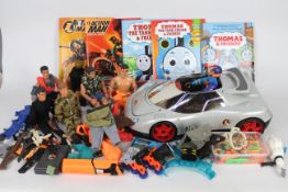 Action Man - A collection of 7 figures, accessories, Silver Speeder car, 2 annuals,