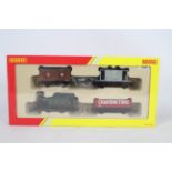 Hornby - A OO Gauge Railroad Train Pack # R2670 containing an 0-4-0 tank engine number 104 in GWR