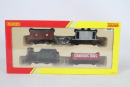 Hornby - A OO Gauge Railroad Train Pack # R2670 containing an 0-4-0 tank engine number 104 in GWR