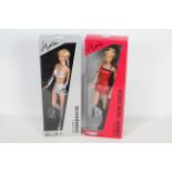 A collection of two Kylie figures by Jakks Pacific inc.