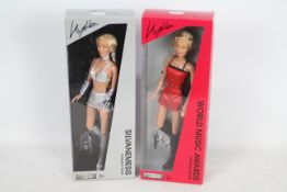 A collection of two Kylie figures by Jakks Pacific inc.