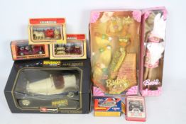 Matchbox - Bburago - Mattel - 5 x boxed vehicle models and 2 x boxed Barbie dolls including 1932