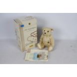 Steiff Teddy Bear - A boxed Steiff Blonde Mohair bear with friendship bracelet 'Anna The Friendship