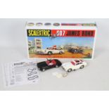 Scalextric - A boxed set containing two rare vintage Scalextric 'James Bond 007' slot cars.