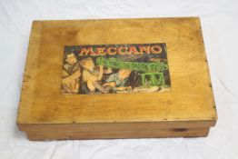 Meccano - A wooden lift off lid box with Meccano image on lid, featuring handles to both ends,