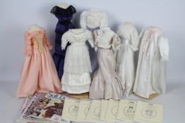 Lady Beth Trousseau - A collection of seven hand made doll outfits comprising six dresses and one