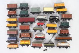 Hornby Dublo - An unboxed group of approximately 30 Hornby Dublo OO gauge wagons and tank wagons.