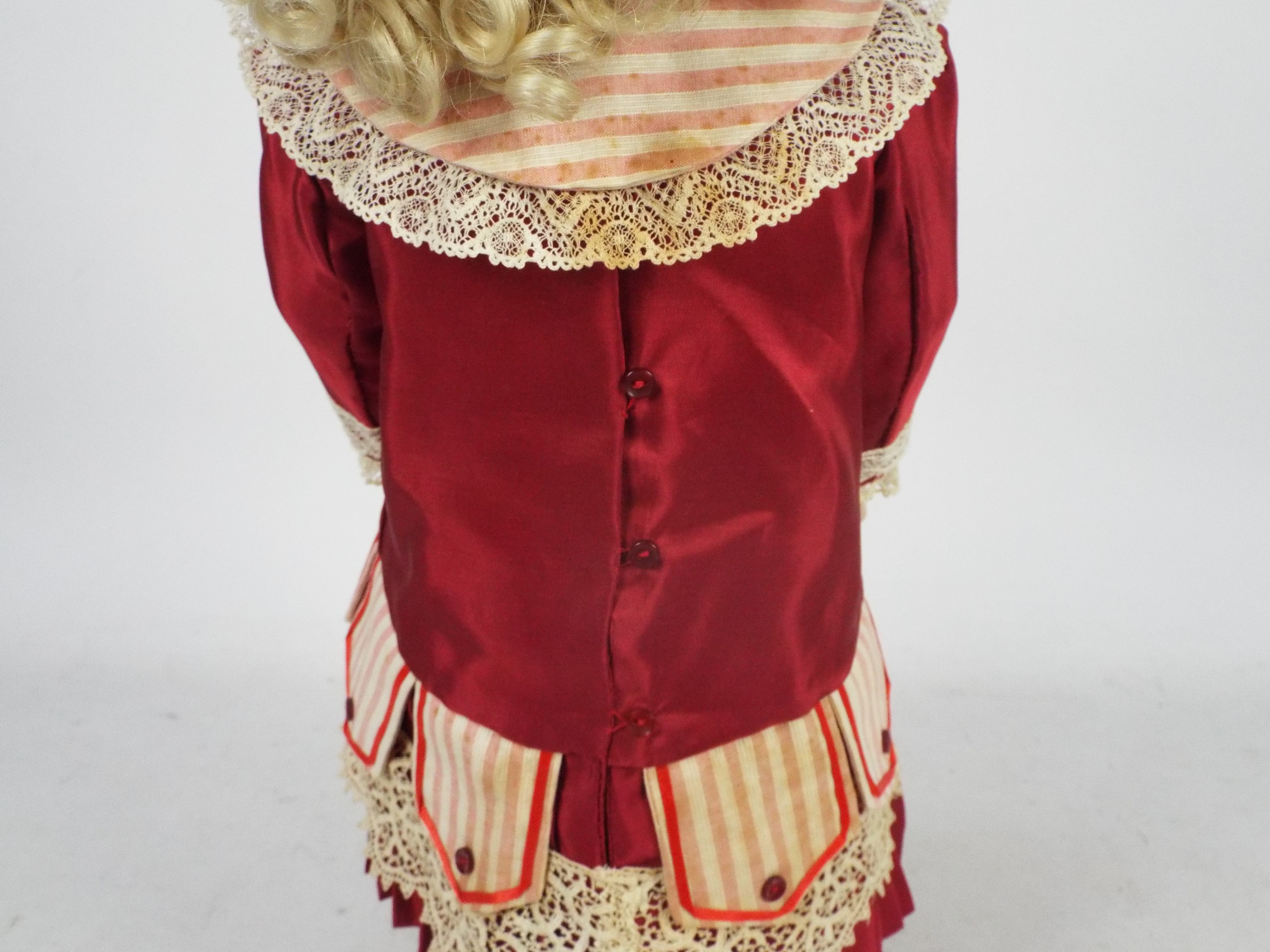 Bru Jne - A reproduction of a Bru Jne bisque head doll on stand. - Image 10 of 13