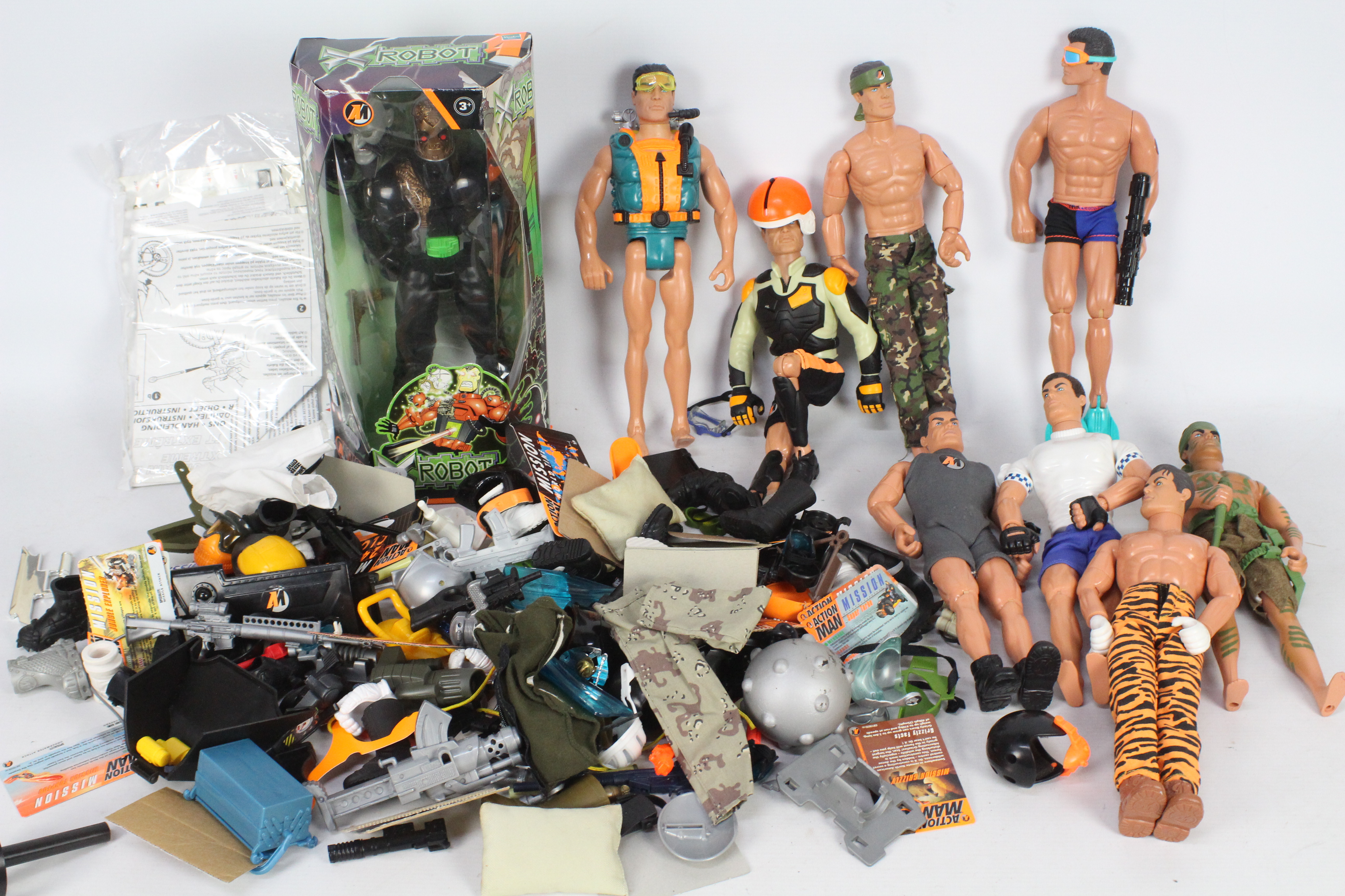 Action Man - A collection of 8 unboxed figures, 1 boxed X Robot unopened, Accessories.