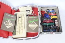 Acorn - Tri-ang - Scalextric - A vintage Acorn Electron computer with power lead,