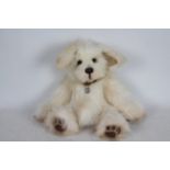 Foxglove Bears - A faux fur 'Indy' dog with glass eyes, suede paws, metal joints,